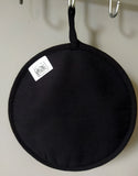 Backside of the “Meta-Absinthe nr. 4” pot holder by Katrin Valgemäe, featuring a heat-resistant cotton-polyester blend