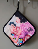 Close-up of “After Third Prosecco” pot holder, showcasing intricate artwork and handmade stitching
