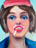 Close-up of the central character’s face in “Femme Fiasco 1,” showcasing bold expressions and vibrant colors