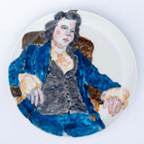 Full view of “Impoverished Nobility 1,” a 19 cm porcelain plate with intricate underglaze and porcelain painting by Katrin Valgemäe