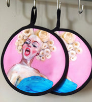 Meta-Absinthe nr. 5” pot holder by Katrin Valgemäe displayed in a kitchen setting, merging practicality with artistic elegance