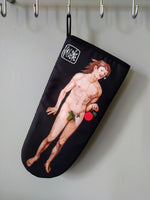 One “Adam” Oven Glove by Katrin Valgemäe in use, featuring a bold and artistic design for kitchen lovers
