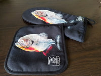 Pair of the “Carnivore” oven glove and matching pot holder, perfect for art enthusiasts and home chefs