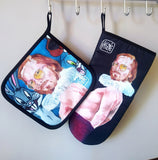 Pervert in the Kitchen” pot holders by Katrin Valgemäe arranged on a table, showcasing their bold and functional design