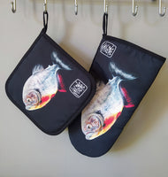 Set of “Carnivore” oven glove and pot holder by Katrin Valgemäe, elegantly displayed and ready for use