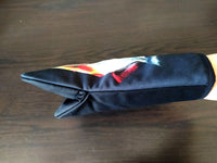 Side view of the “Carnivore” oven glove by Katrin Valgemäe, highlighting the unique fish artwork and durable design