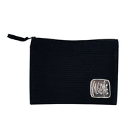 Detail view of the nylon zip and herringbone puller on the “Bitches and Poodles” cosmetic bag